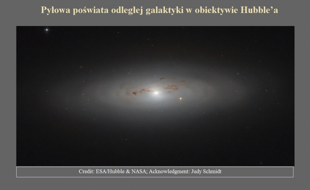 Pyłowa poświata odległej galaktyki w obiektywie Hubble?a.jpg